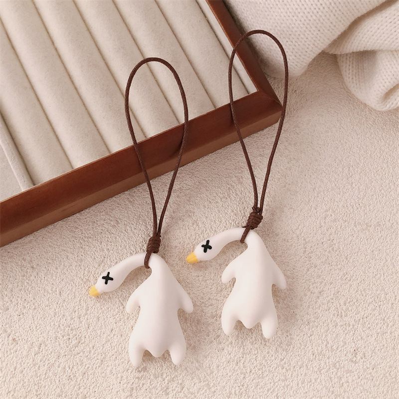 Pato asado que cambia de color Pato protector solar 2025 nuevo colgante de bolsa que cambia de color