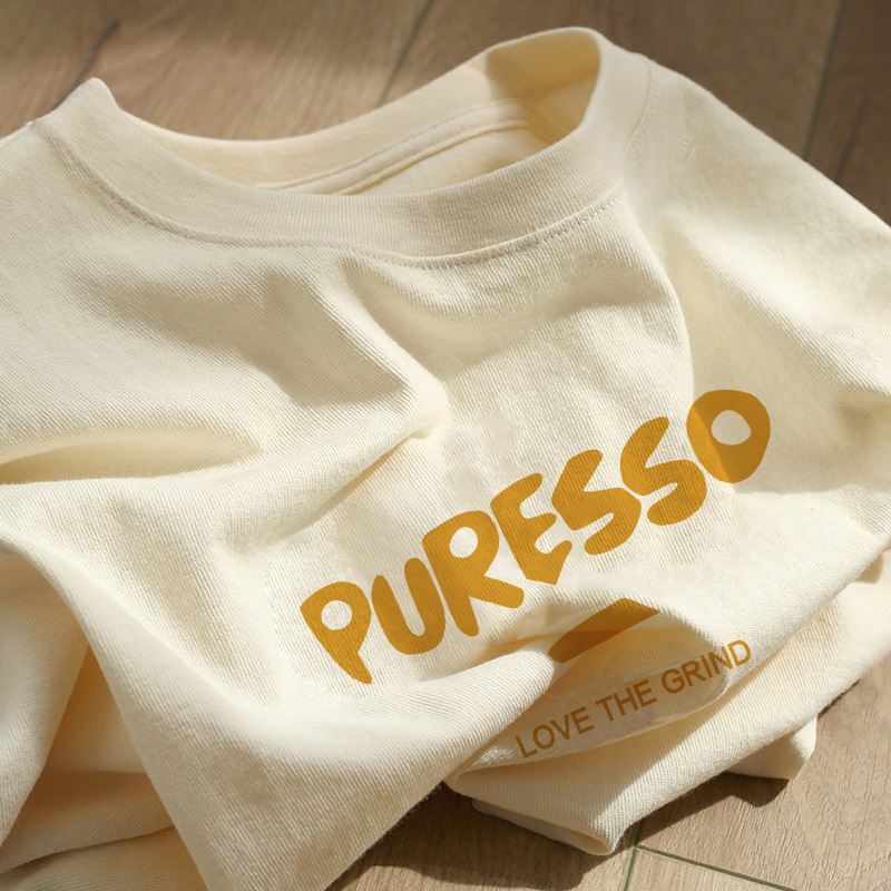 アメリカの純綿の肩の半袖のtシャツの女性2025新型の夏の大きいサイズはゆったりしています。