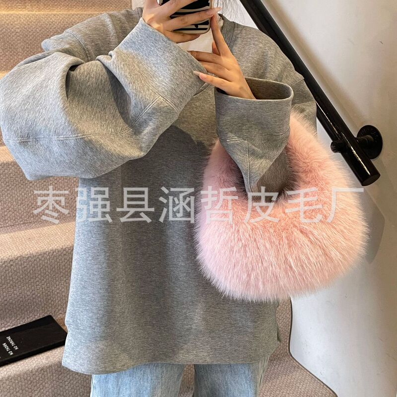 Autumn and winter new fluffy faux fox fur bag Korean-style versatile hand-held plush dumpling bag Autumn and winter new fluffy faux fox fur bag Korean-style versatile hand-held plush dumpling bag