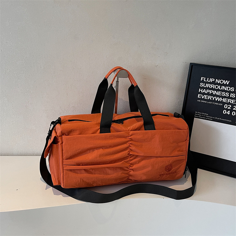 Nueva bolsa de viaje para mujeres, bolsa de fitness ligera, bolsa de yoga deportiva de moda, bolsa de mano secada y húmeda.
