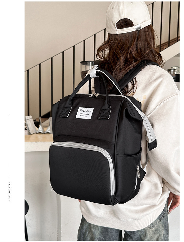 Solid-color lightweight mom bag, a backpack for taking kids out, multi-functional large-capacity mother and baby bag for girls undefined