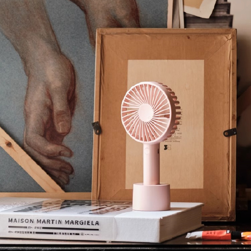 Handheld cute small air fan for students