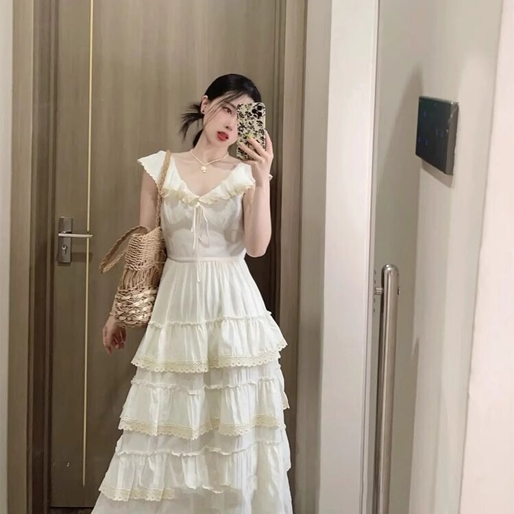 The Fugitive Princess's Apricot-Colored Cake Dress with Fluttering Sleeves, Ethereal and Gentle Style, High-End Exquisite Spaghetti Strap Long Dress for Spring and Summer