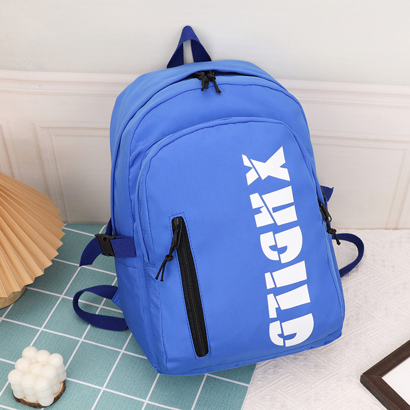 Mochila de moda de moda para hombres 2023 nueva mochila de hombro femenina de gran capacidad de letras de escuela secundaria mochila escolar