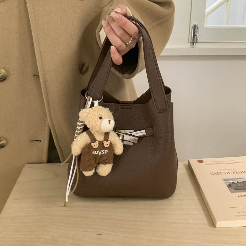 Bolsa de viaje coreana para niños y madres, bolso de balde de mano de mujer de alto nivel, bolso de lichi transfronterizo, bolso de Kelly, bolso de hombro