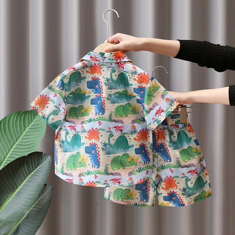 7182 Traje de camisa de dinosaurio para niños 2025 nuevo estilo estilo occidental verano de manga corta ropa de dibujos animados ropa de verano Han Fan para niños