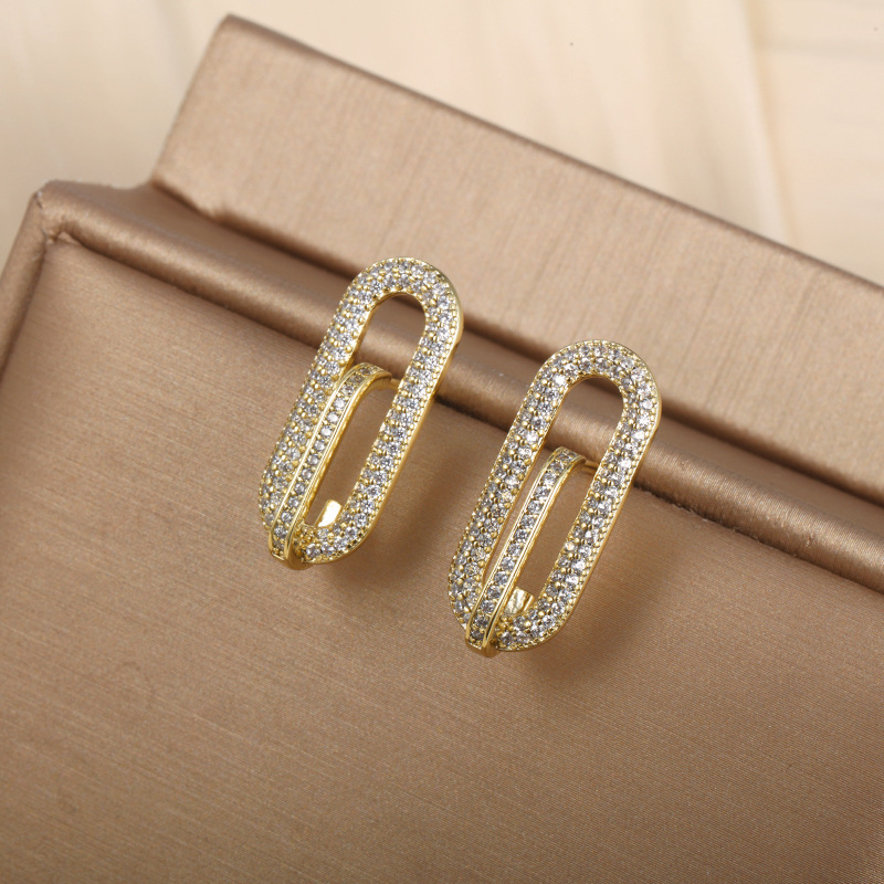 Xuping joyas geométricas elípticas micro incrustadas con orejetos de zircón, nicho de alto nivel, orejetos transfronterizos europeos y estadounidenses, orejetos para mujeres