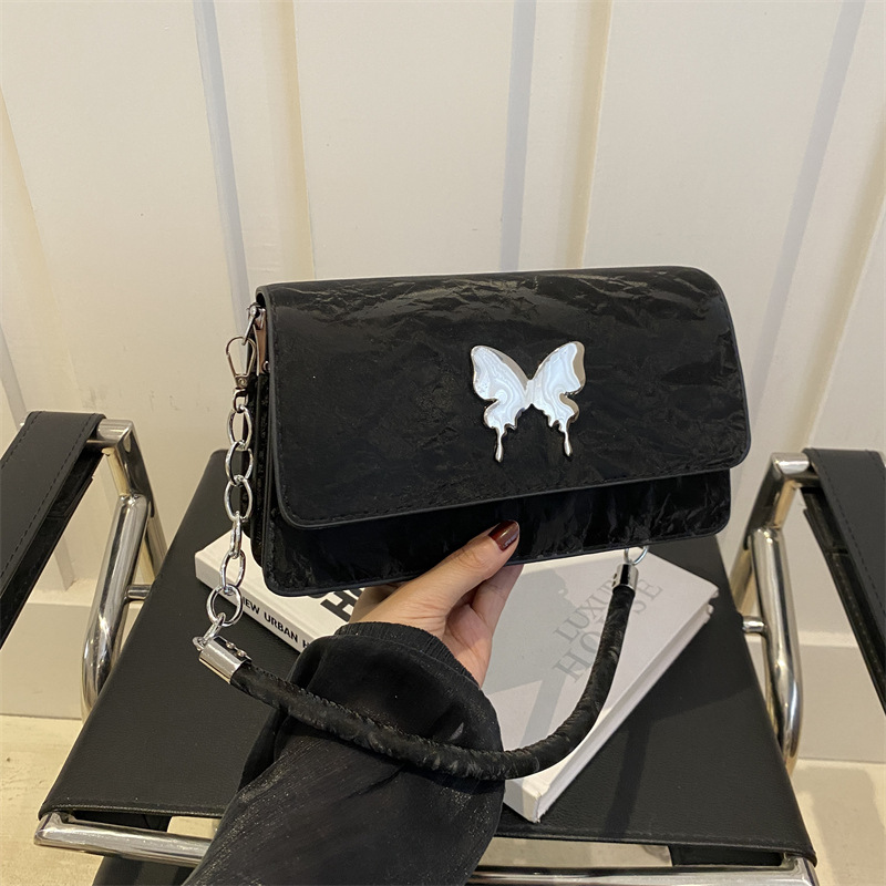 Nicho de diseño de bolso de brazo para mujeres 2024 nuevo arco de moda bolso pequeño cuadrado versátil bolso de hombro