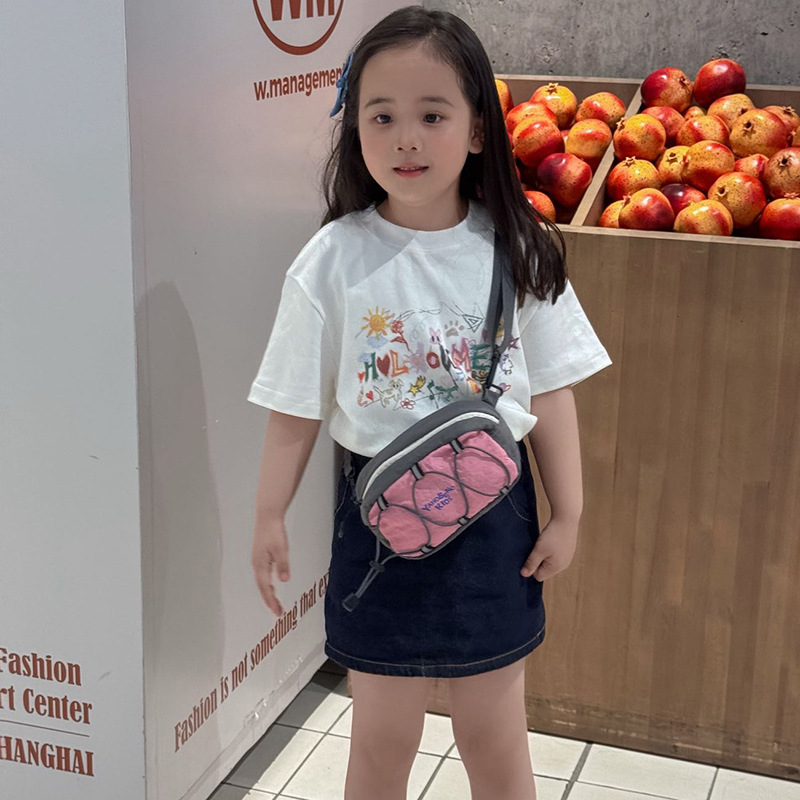 2026 versión coreana de la cuerda extranjera, bolsas de hombro para hombres y mujeres, bolsas de hombro ligeras y compactas, bolsas de hombro de color, nuevas bolsas de niños transfronterizas