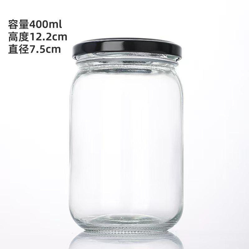 Botella de vidrio al por mayor botella vacía de grado alimenticio hervir botella de conservación de miel mermelada botella de hongos shiitake