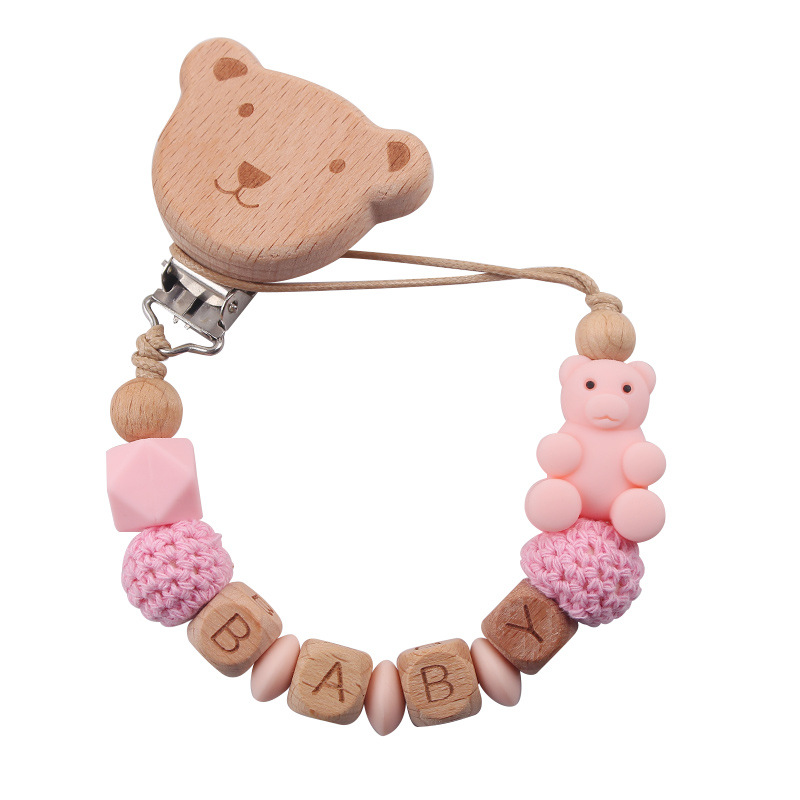 Nuevos productos para la madre y el bebé, clips de oso de haya, juguetes de dientes apretados para bebés, cadena de chupete de oso de oso de animales de dibujos animados