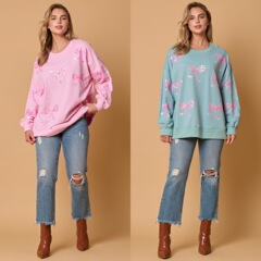 アマゾン秋冬の新型越境欧米の婦人服の蝶結びのスパンコールの上着のカジュアルなゆったりした長袖のカーディガンの女性