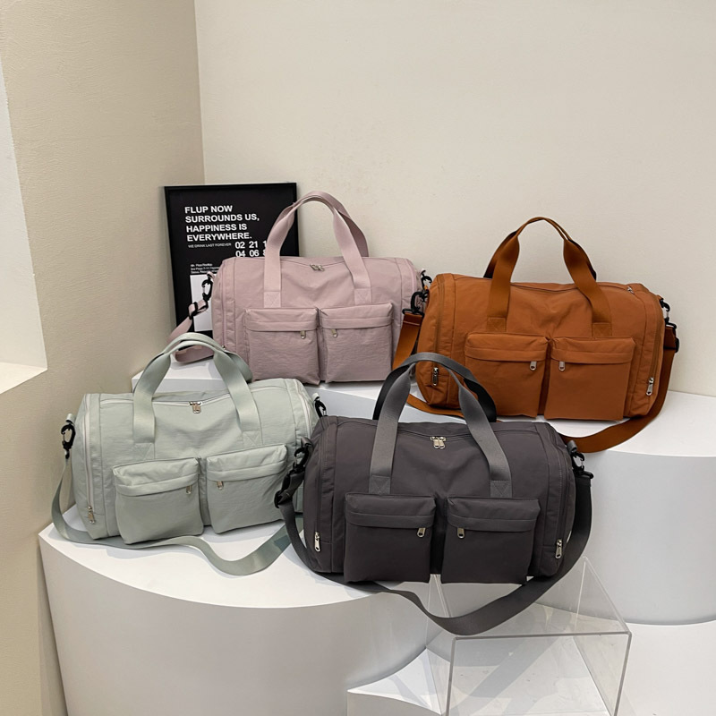 Bolsa de viaje de gran capacidad de textura retro bolso de almohada de moda 2025 nuevo bolso de hombro universal bolso de viaje