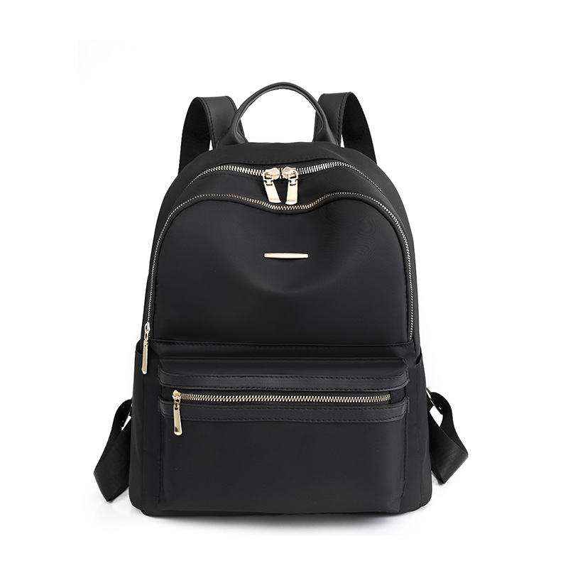 2022 nueva versión coreana de la mochila de nailon para mujer, mochila de cercanías urbana de todo fósforo de moda, mochila escolar ligera al aire libre