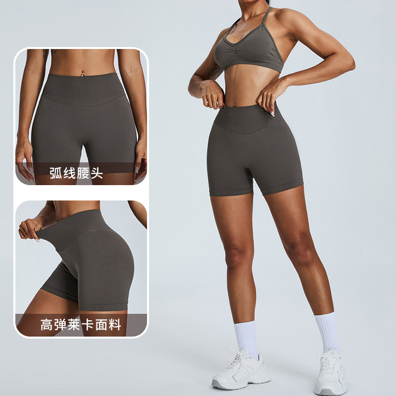 Nuevos pantalones cortos de yoga de melocotón de miel de Europa y los Estados Unidos, pantalones cortos deportivos sin costuras de caderas de mujer, pantalones cortos apretados de secado rápido.