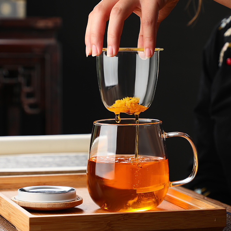 Juego de tres piezas de vidrio de borosilicato taza de separación de té taza de té cubierta de acero filtro de vidrio flor taza de té taza de beber