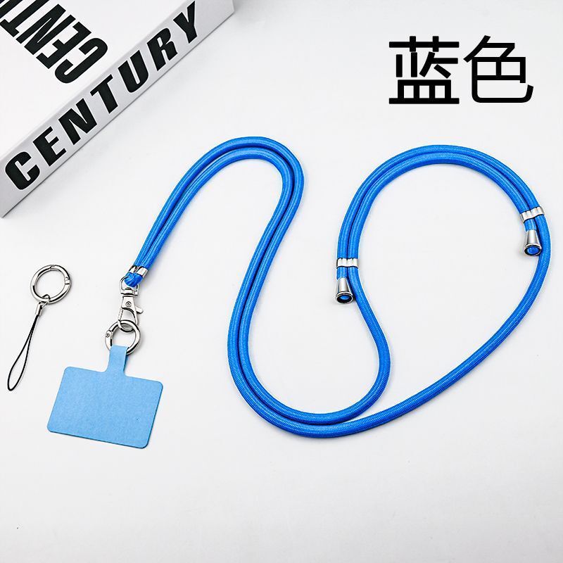 携帯電話のストラップの首が斜めにまたがっています。|undefined