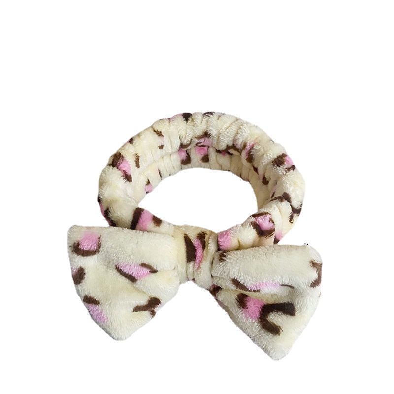 Europa y los Estados Unidos ondulado punto de leopardo coral mariposa fin correa de cabello mujer lavado cara banda de cabello rayas transfronterizas peluche adornamientos para el cabello al por mayor