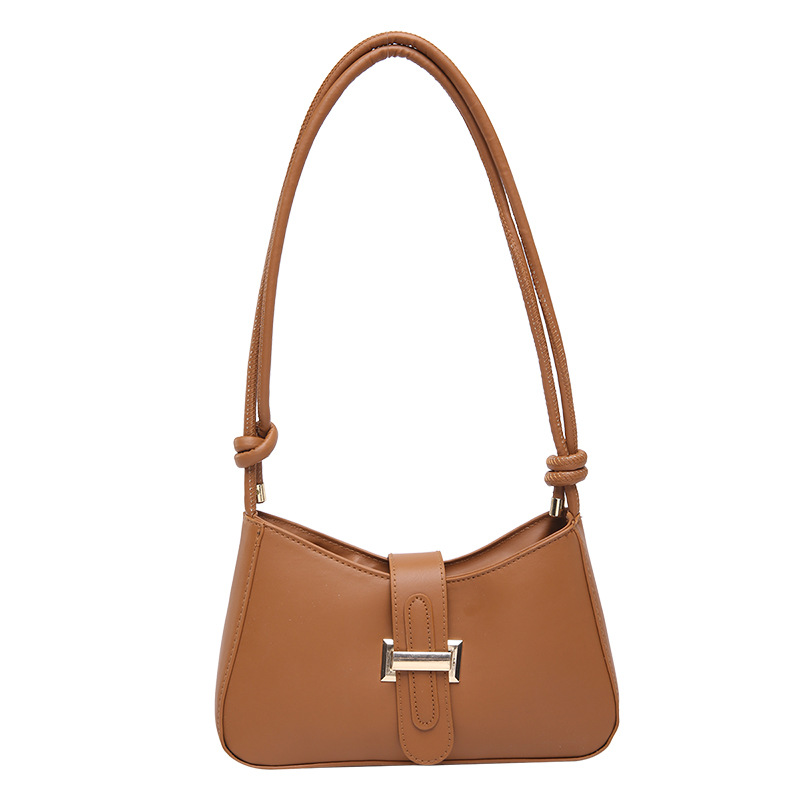 Bolsas de hombro para mujeres 2025 primavera nuevo cinturón de cinturón nuevo bolso de brazo de mujer simple bolso de hombro de mujer