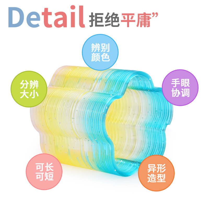 24 A box of medium shaped rainbow ring polygon spring ring students small gifts to push small toys wholesale