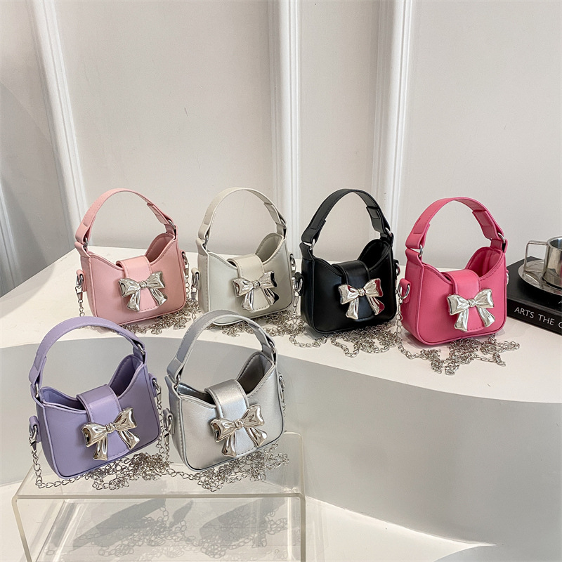 Bolsas para niños nuevas niñas color caramelo arco mini bolsos de mano niñas cadenas de padres e hijos bolsos de lápiz labial