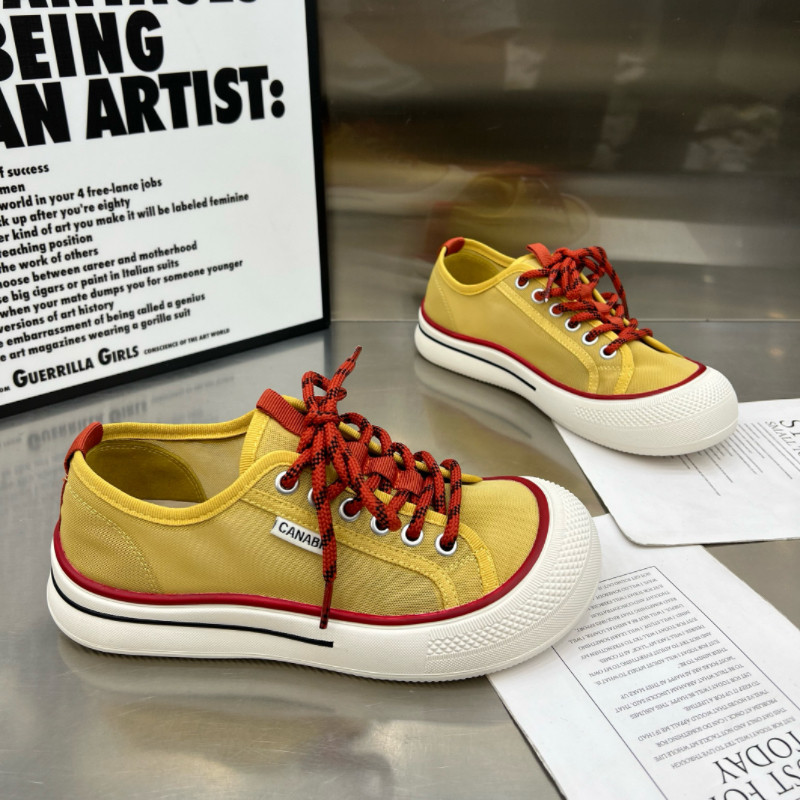 Zapatos de lona de cabeza redonda transpirables de color sólido de suela gruesa para mujeres verano de 2026 nuevos zapatos de lona casuales de correa de color sólido coreano