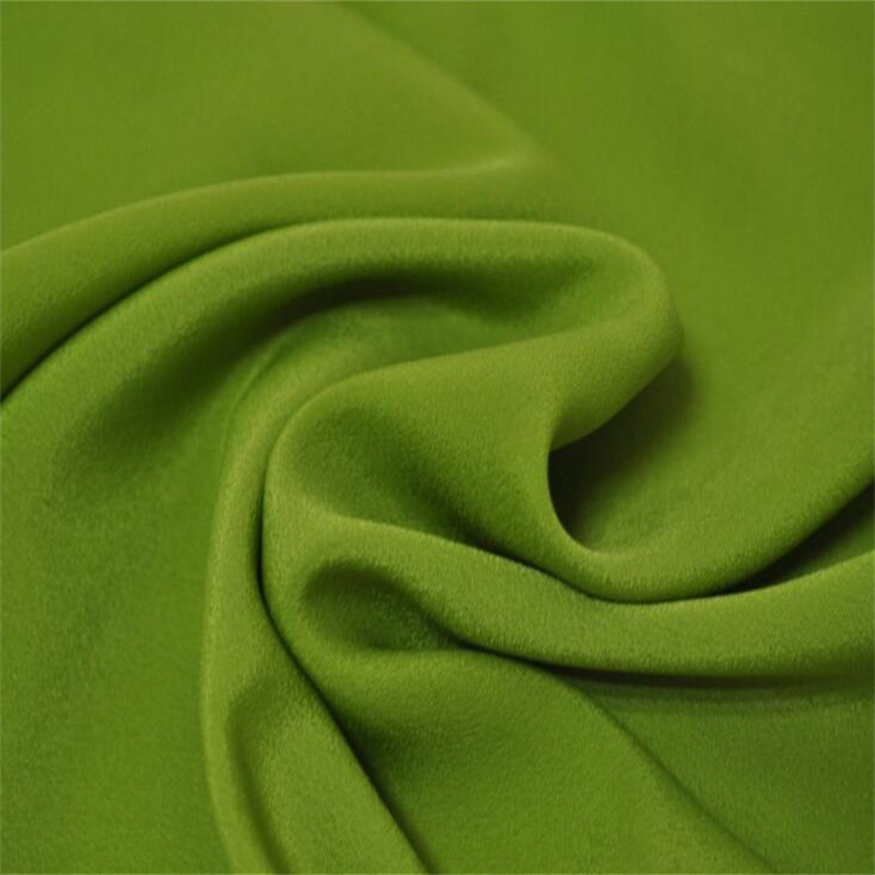 100%涤纶50D+50D*150D复合丝纬弹花瑶绉女装面料