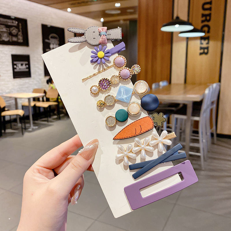 Clip de flequillo lateral rojo de la red femenina 2025 nueva horquilla simple clip de una línea horquilla clip de cabello roto tocado clip de pico de pato