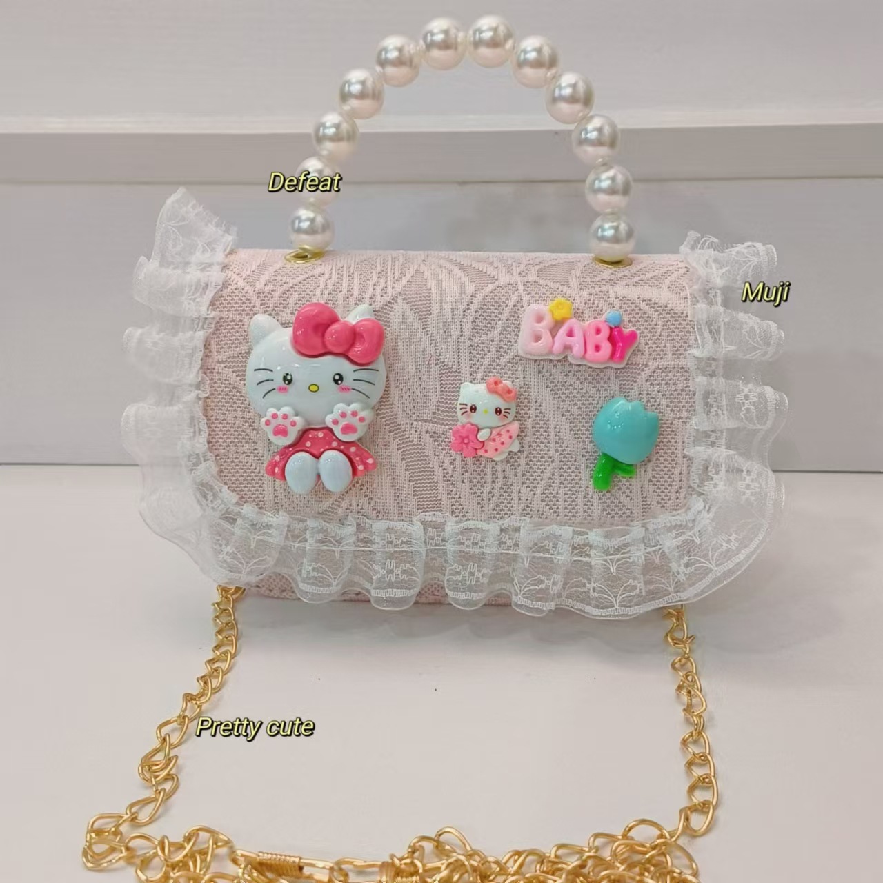 Cartoon KT feline bolso bolso de perla bolso de hombro mochila bolso de cambio bolso de cadena bolso pequeño bolso cuadrado bolso para niños