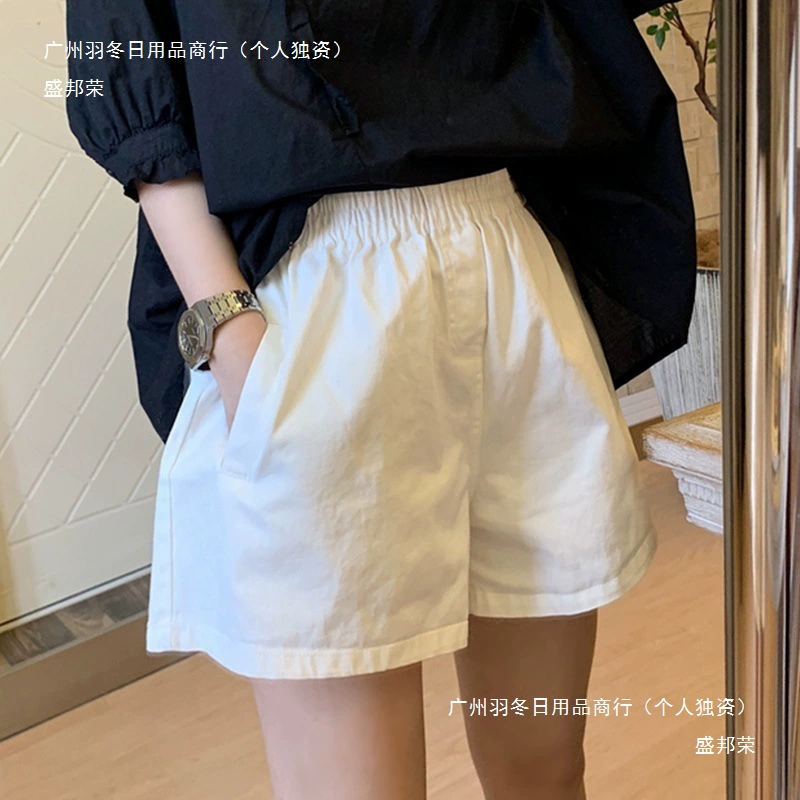 Белые повседневные спортивные шорты с эластичной резинкой на талии для женщин, летний тонкий стиль, свободный крой, утягивающие широкие шорты трапециевидной формы с тремя точками, модные модели.