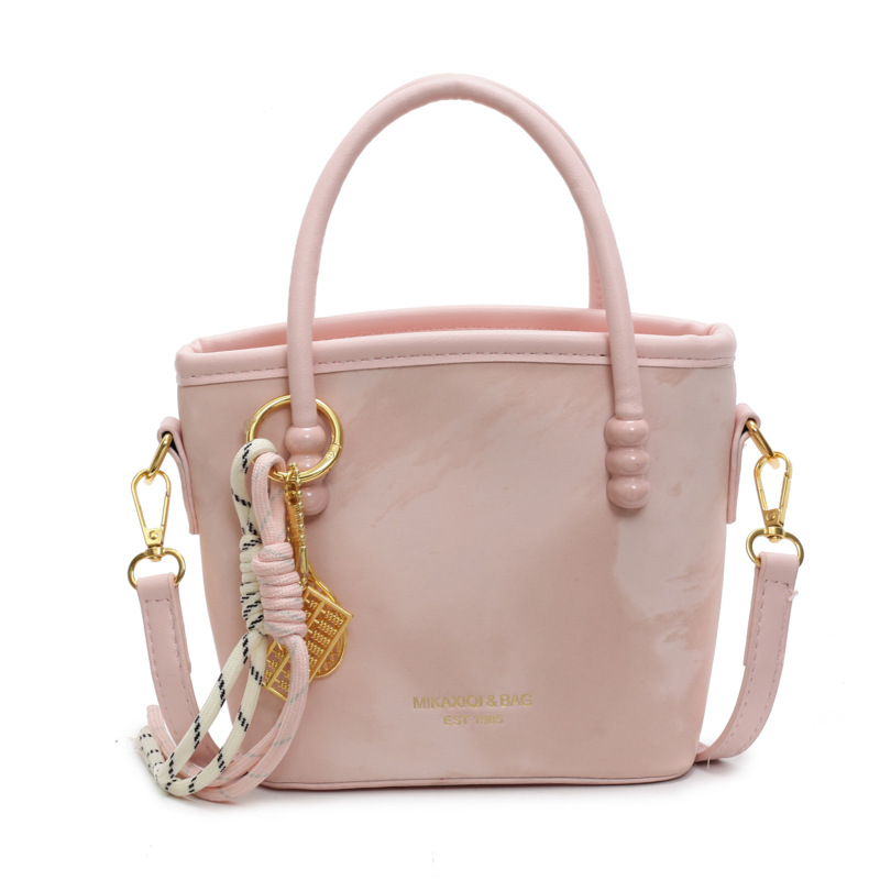 Comercio exterior venta caliente bolso de cubo de mano damas 2025 nuevo estilo de tendencia universal bolso de hombro de alta calidad bolso de moda