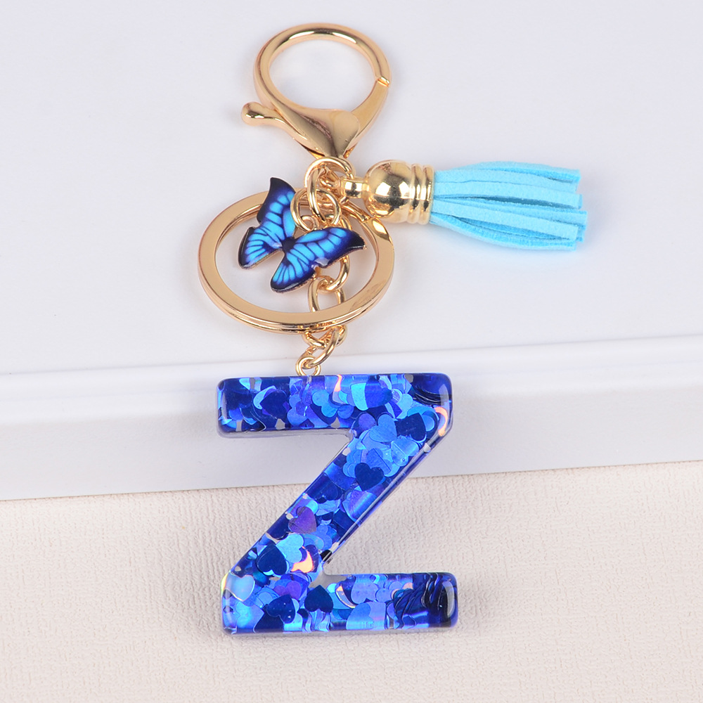 Cross-border Hot Sale 26 letras inglesas llavero de resina de goteo de goma esquinilla llavero de letras de amor personalizado