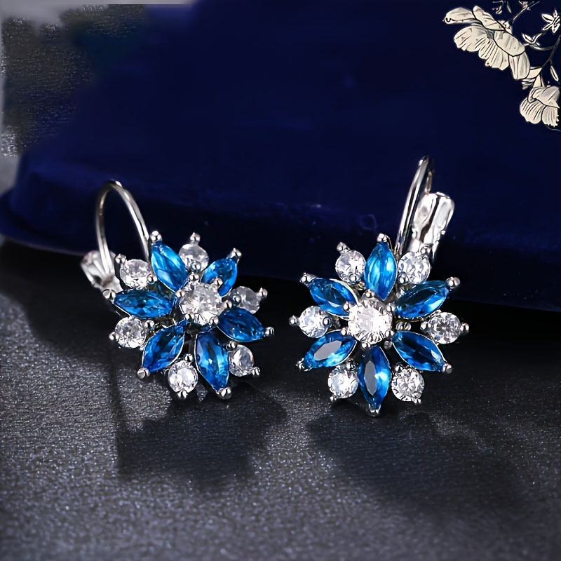 Ventas transfronterizas de flores de sol zircon bucles de orejas creativos nuevos clips de orejas de moda agujeros de orejas nuevos auriculares retro chinos