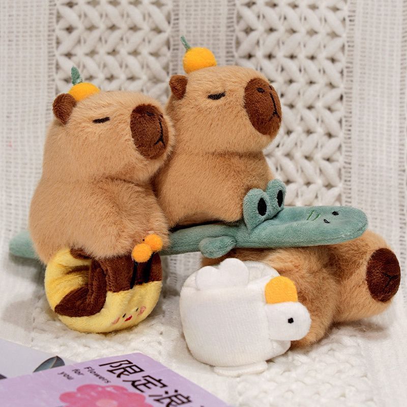 カピバラのパチパチの創意的な手環のかわいい動物のぬいぐるみの人形のおもちゃの卸売りは萌えます。