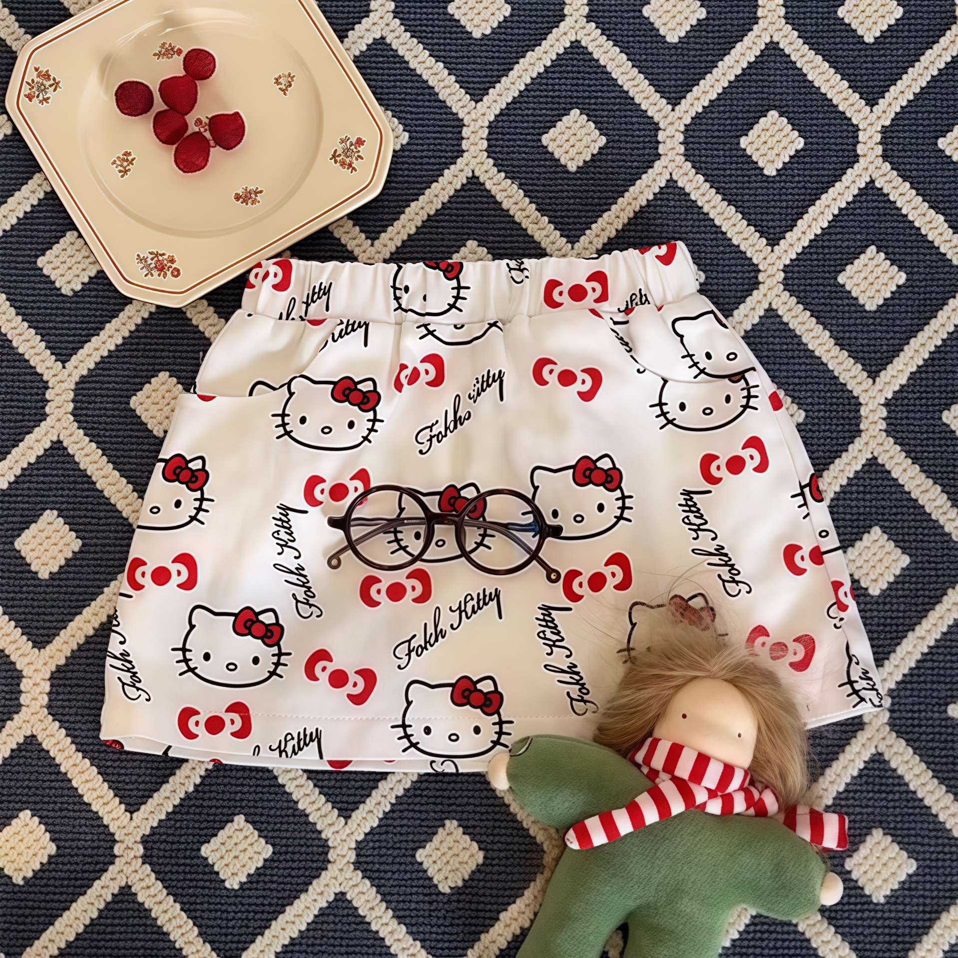 Xianning siete niñas nueva falda corta tesoro femenino verano impresión completa KT gato falda de dibujos animados salvaje estilo occidental red de Internet ropa para niños