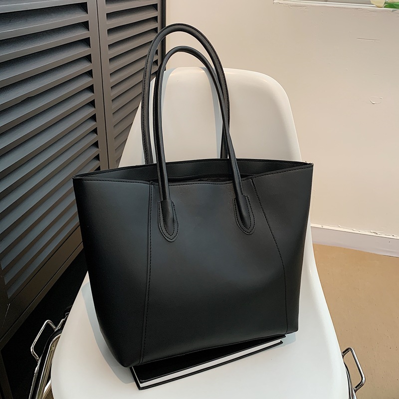 Bolsa de viaje para mujeres 2024 nueva bolsa de viaje de gran capacidad otoño alta sensación de bolso de hombro universal simple bolsa de clase