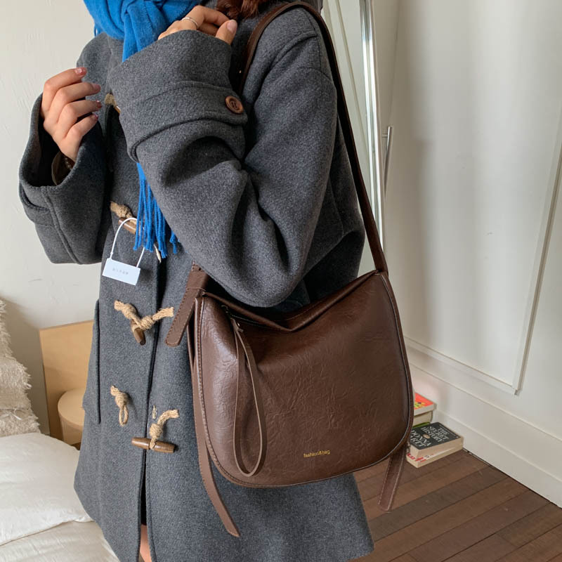 Bagos de hombro anchos nichos de alta calidad para mujeres 2025 nuevo paquete de cubo de viaje de gran capacidad