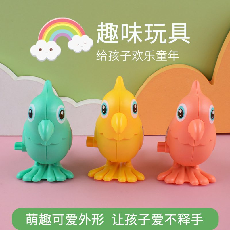 Winding loro lindo pájaro reloj de juguete para niños sinuoso salto puesto Venta caliente Parque atracciones regalos al por mayor