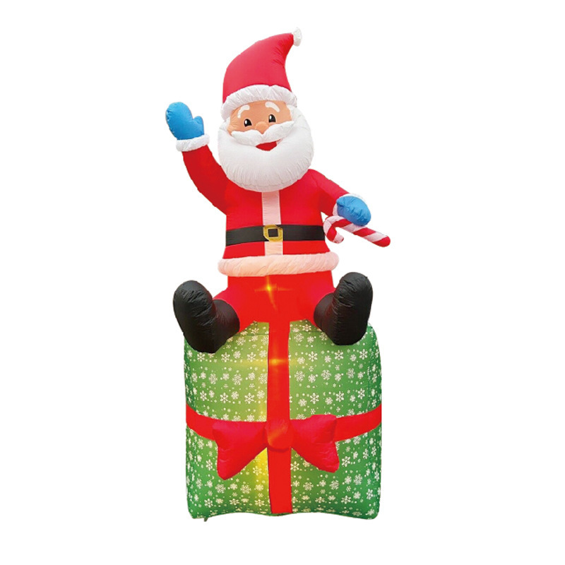 国境を越えたクリスマスの祝日のギフトバッグが光るサンタクロースの空気入れ型装飾品が壁に登るクリスマス用品|undefined