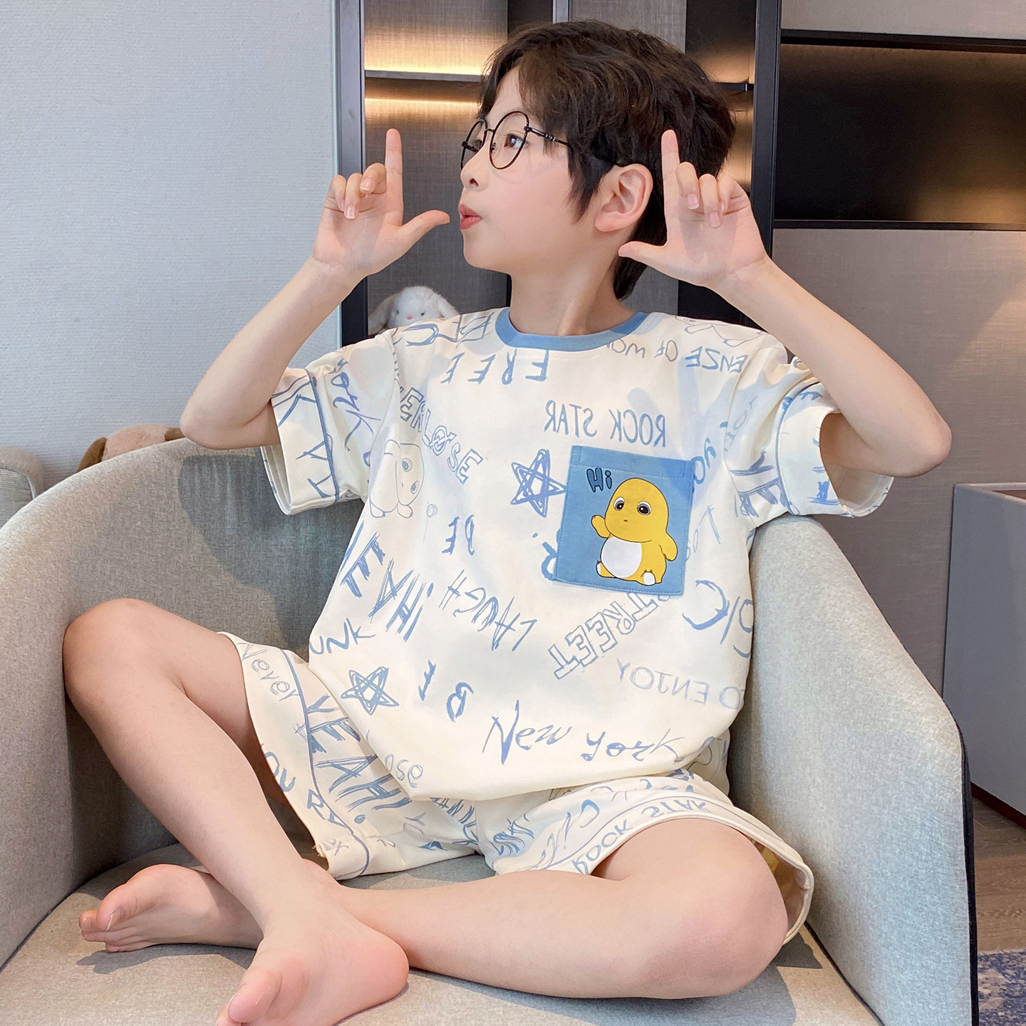 Pijamas para niños 2026 nuevo verano delgado transpirable algodón de manga corta dibujos animados para niños grandes ropa para el hogar