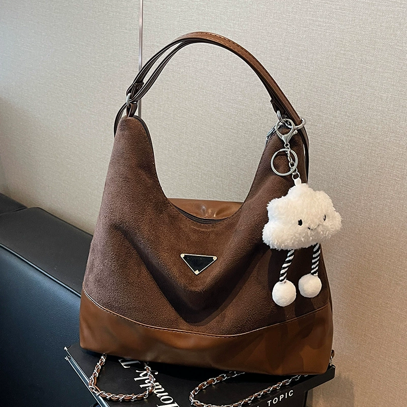 Capacious one-shoulder bag, trend shoulder bag, worn on the shoulder