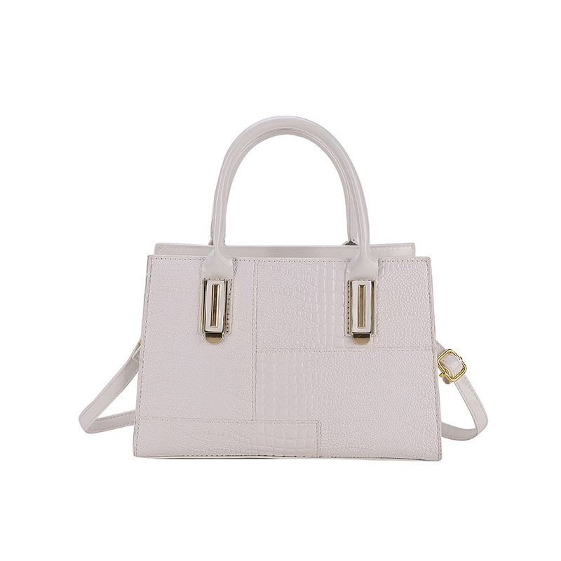 2023 nuevo bolso de platino con patrón de cocodrilo retro, bolso de costura de moda femenina, bolso de mensajero de hombro de viajero de todo fósforo