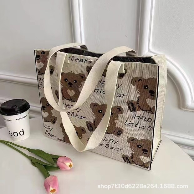 Cartoon adorable oso de gran capacidad bolso de hombro portátil de moda versátil bolso de punto de viaje bolso de mamá bolso especial