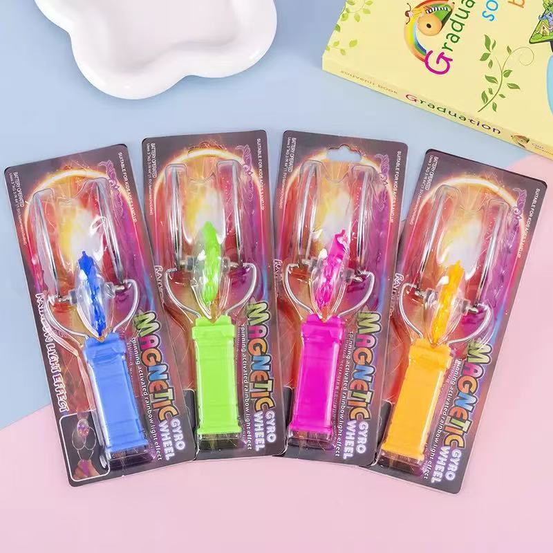 Magia vuela giroscopio estand novedad juguetes al por mayor colorido giroscopio luminoso órbita mágica giroscopio magnético
