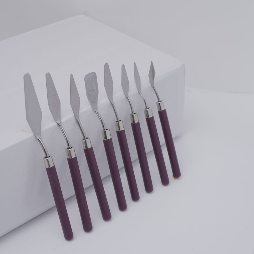 Juego de ocho raspadores de caoba