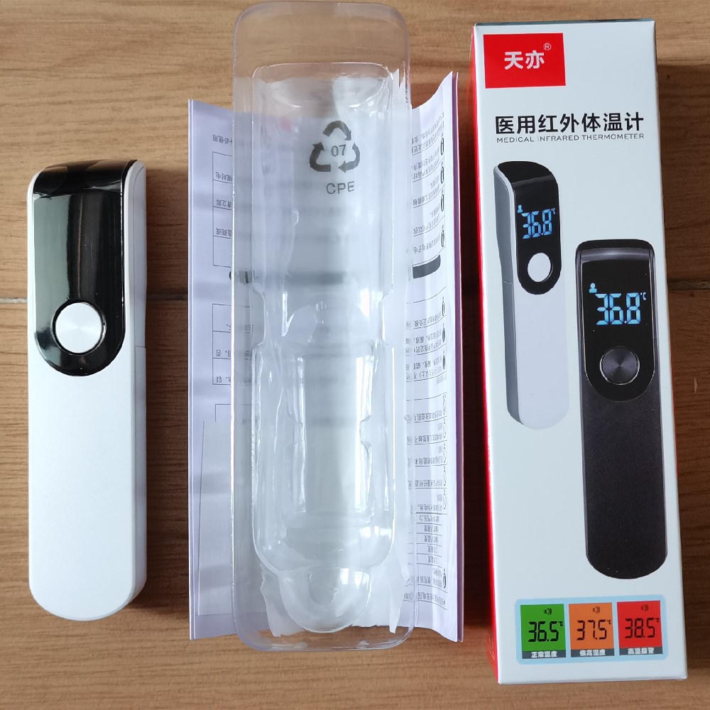 Fabricante original Mini termómetro de frente termómetro electrónico infrarrojo sin contacto de mano termómetro de bebé japonés chino e inglés