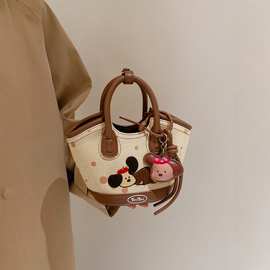 TOUtou时尚休闲小狗手提菜篮子包可爱水桶包2025新款单肩斜挎包女