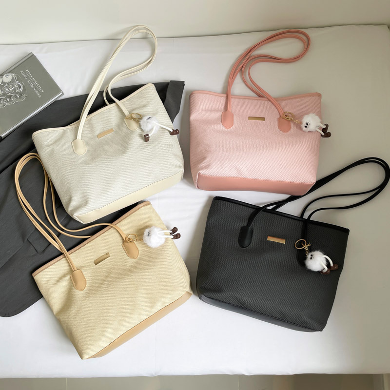 Moda francesa de alta calidad de moda textura bolso universal para mujeres otoño 2025 nueva gran capacidad de viaje bolsa