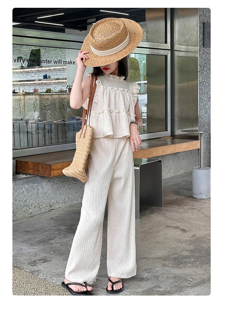 Completo bimba top senza maniche e pantaloni gamba larga_voghion.com