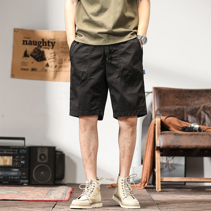 2022 TikTok populares pantalones cortos de cinco puntos pantalones casuales sueltos casuales de los hombres cintura elástica pantalones de playa suministro de entrega de una sola pieza